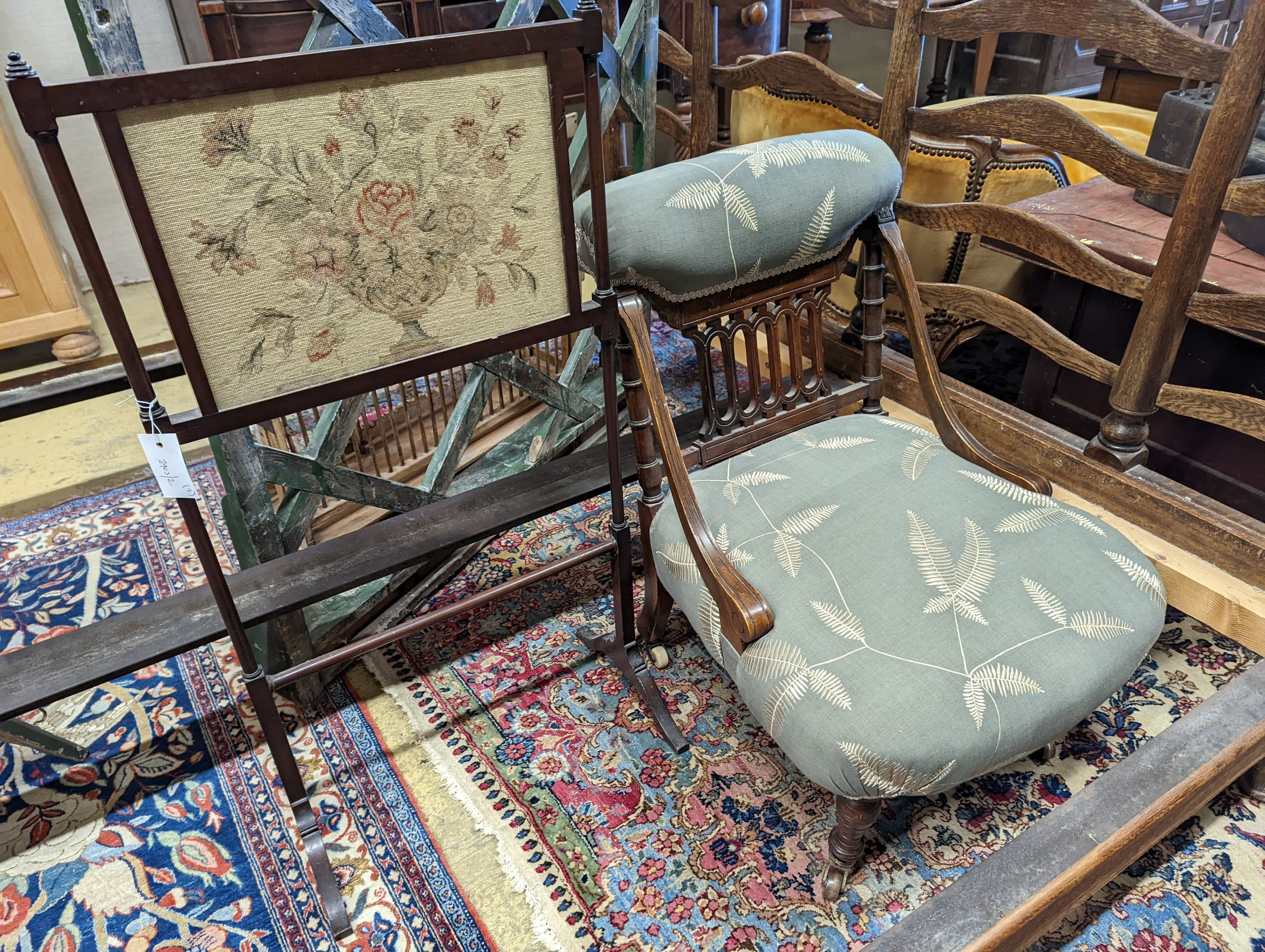 A Victorian upholstered nursing chair, together with a later fire screen